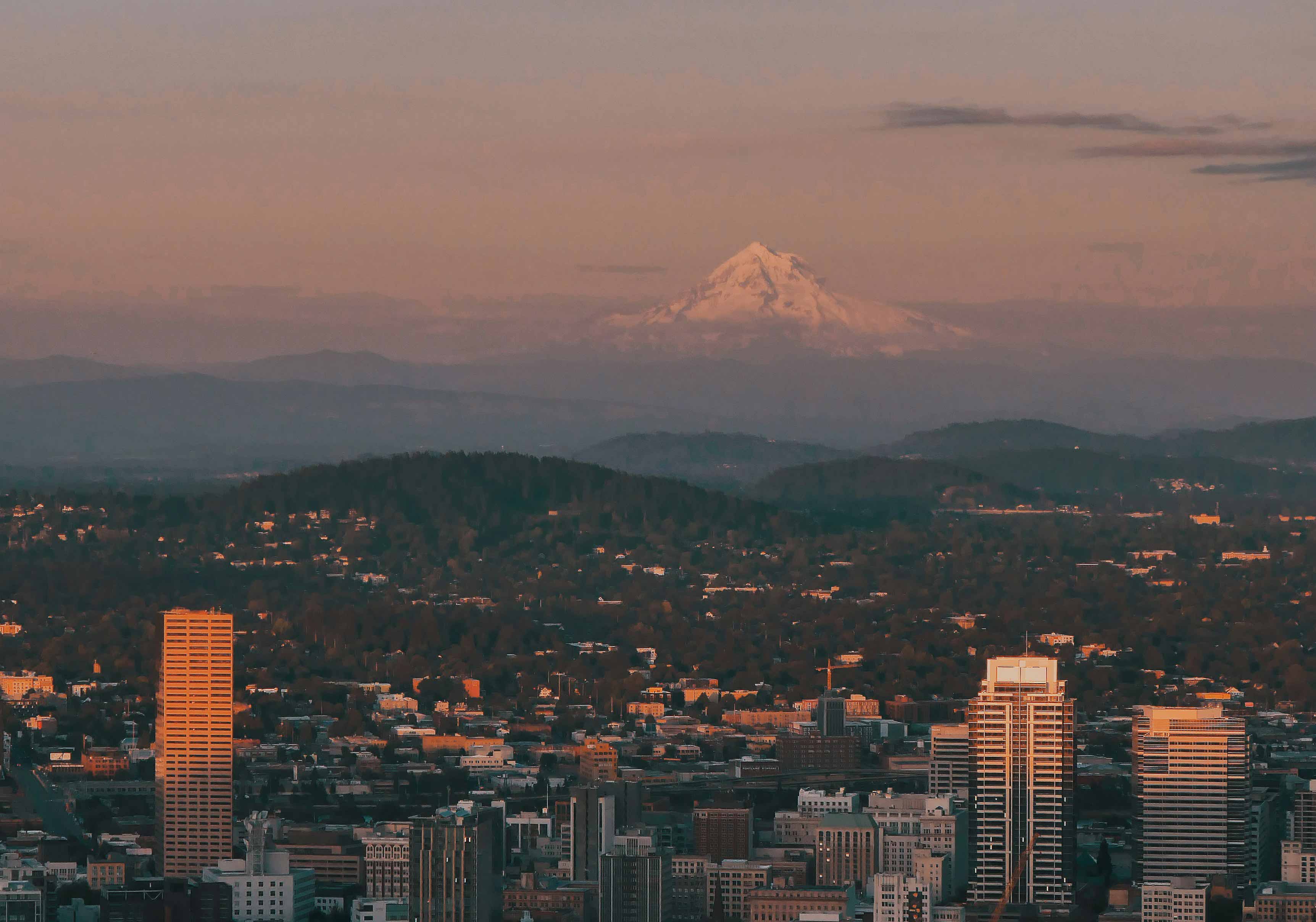 beautiful city landscape with the sun setting