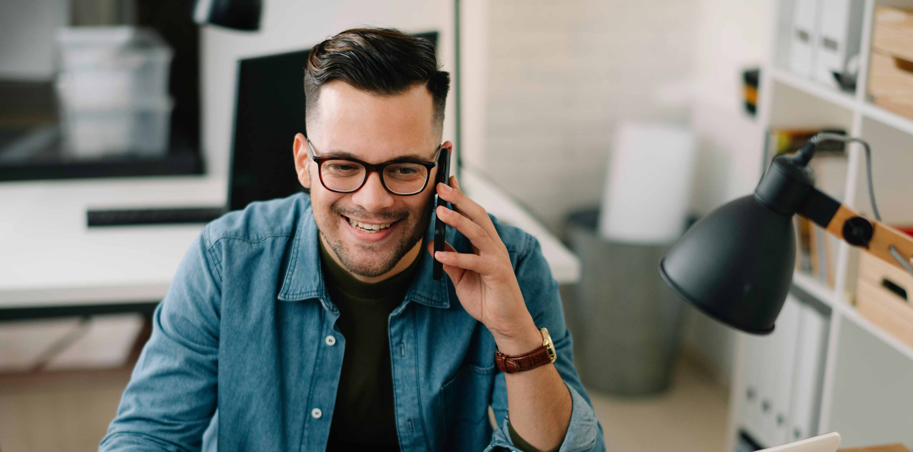 person talking on the phone with his accountant